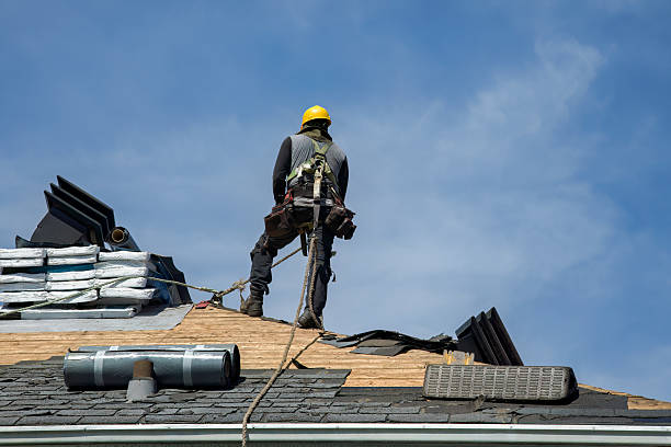 Professional Gutter Installation technician working in Oskaloosa, IA